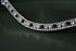 Frontal strass blancs, perles et strass noirs WWF